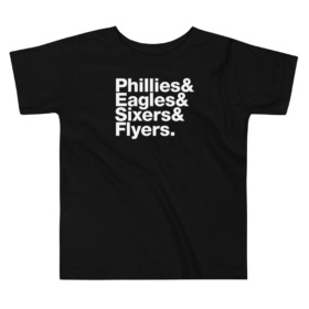 Philadelphia Sports Teams toddler black shirt that says "Phillies & Eagles & Sixers & Flyers."
