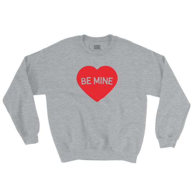 Heather gray sweatshirt that says BE MINE inside of a red heart