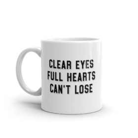 White mug that says CLEAR EYES FULL HEARTS CAN'T LOSE 11oz handle on left