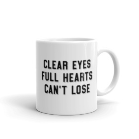 White mug that says CLEAR EYES FULL HEARTS CAN'T LOSE 11oz handle on right