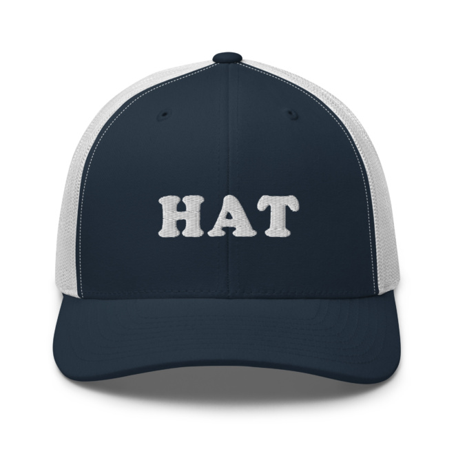 Navy and white trucker hat that says hat front