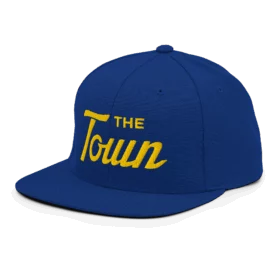 THE Town script snapback hat gold on blue left front