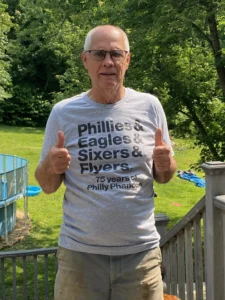 Happy WRDMRK customer wearing heather gray custom ampersand t-shirt
