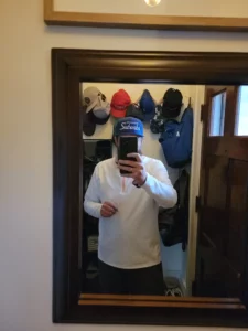 Happy WRDMRK customer wearing custom script hat